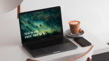 I Macbook on table with iphone and coffe psd