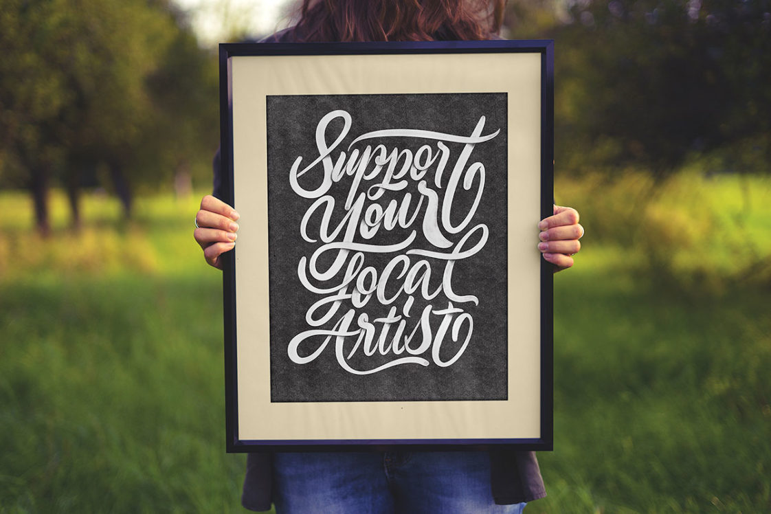 Free Hand Holding Photo/Poster Frame Mockup PSD - PsFiles