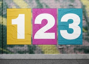 Free Urban Posters Mockup Pasted on Street Wall