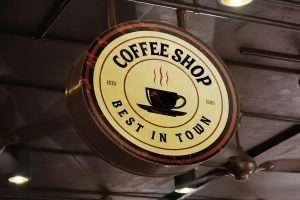 Free Cafe Round Sign Mockup