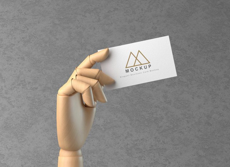 Wooden Hand Holding Business Card Mockup PSD