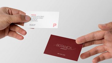 Two Hands sharing thier Business card