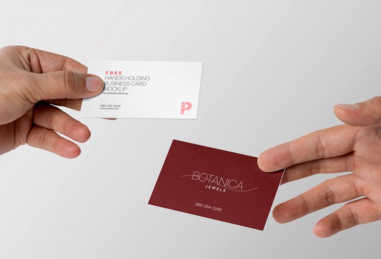 Two Hands sharing thier Business card