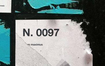 Free Torn Glued Poster Mockup PSD