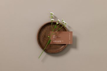 Free Business Card with a Flower Mockup PSD