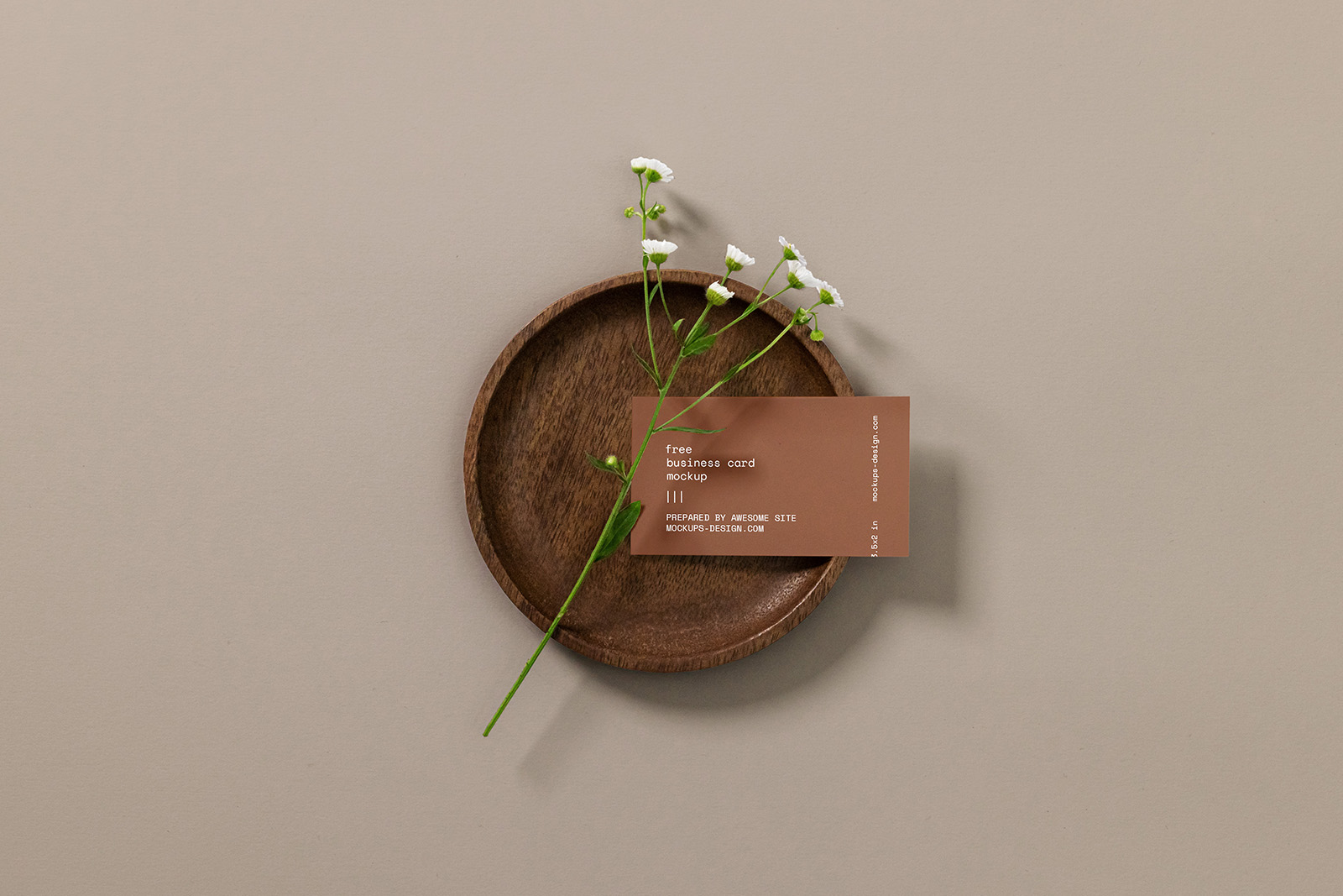 Download Free Free Business Card with a Flower Mockup PSD