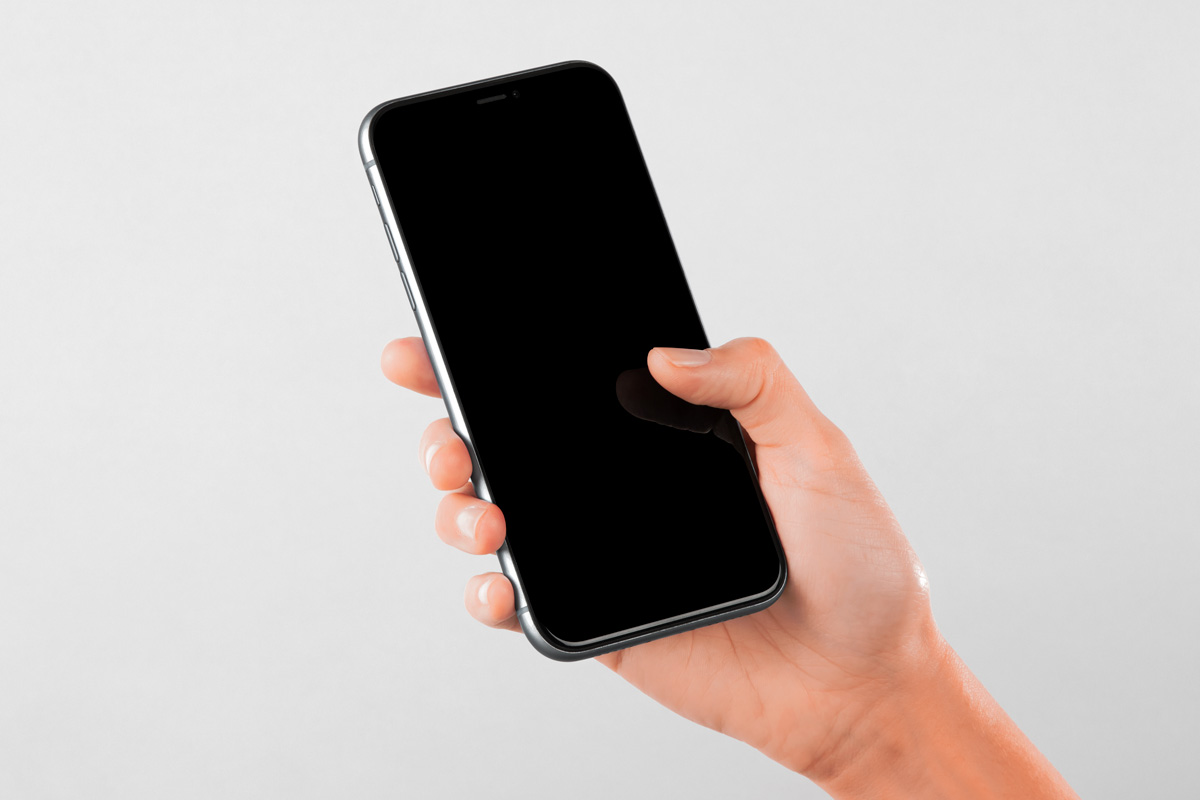 Free Ultra High Quality Hand Holding iPhone Mockup PSD