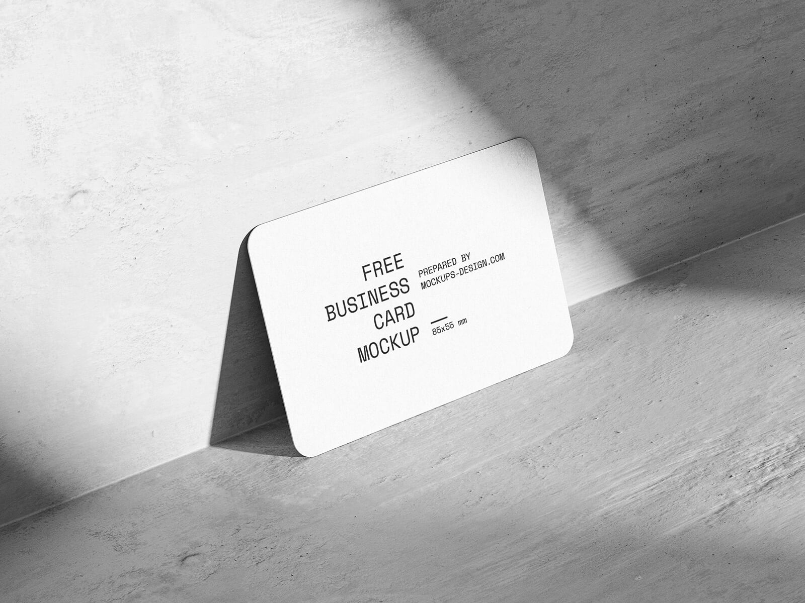 Free Rounded Business Card On Concrete Mockup