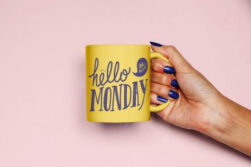 Hand Holding Mug Mockup PSD