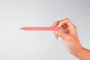 Free Hand Holding Branding Pen Mockup PSD