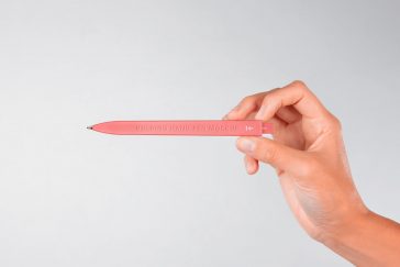 Free Hand Holding Branding Pen Mockup PSD