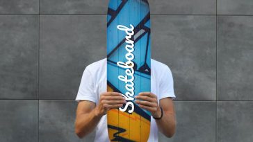 Man Holding Skateboard PSD Mockup