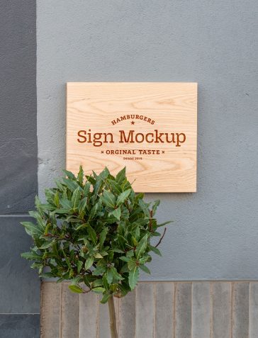 Wood Sign on Wall PSD Mockup