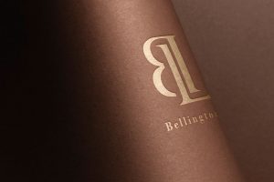 This brown texture paper curved style golden paper punched logo mockup