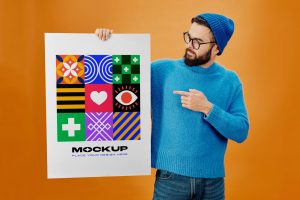 Free Large Hand Holding Poster Mockup PSD