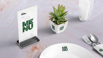 Table Menu Standee Mockup Scene with Plant, Glass, and Plate