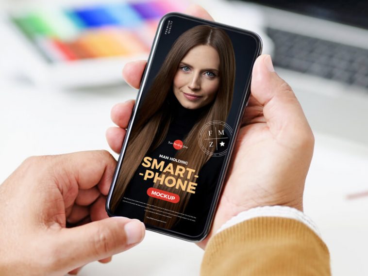 Free High-Quality Person Using Smartphone Mockup