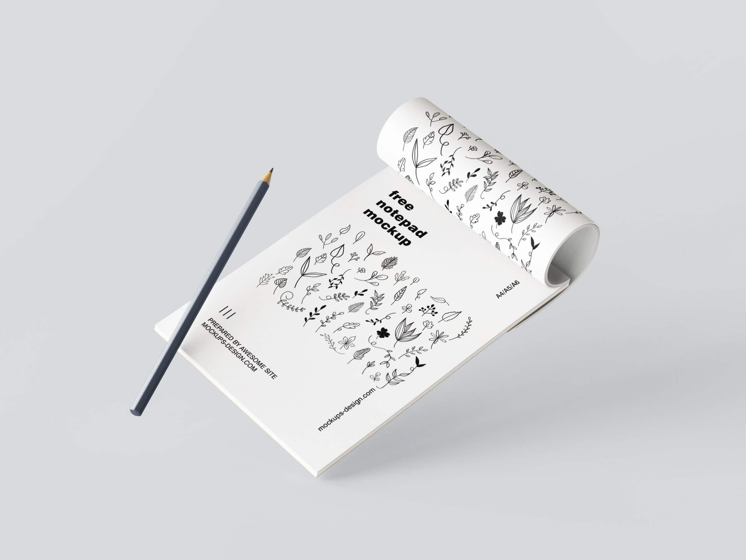 5 Mockups of Notepad with Pencil in Various Perspective Views