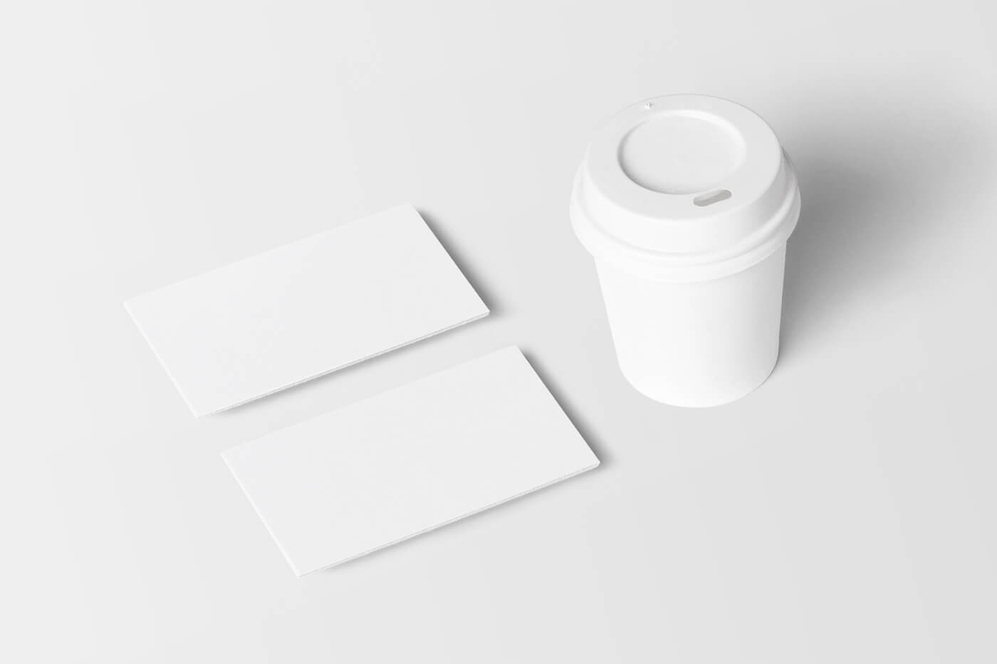 Top Side View of Business Cards Mockup and Coffee Cup