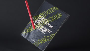 Mockup of a Notebook with Transparent Cover and a Pen