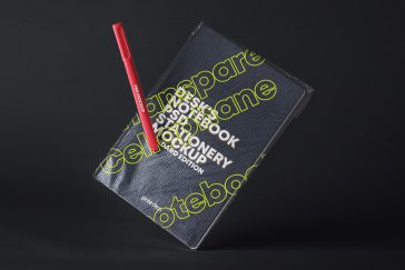 Mockup of a Notebook with Transparent Cover and a Pen