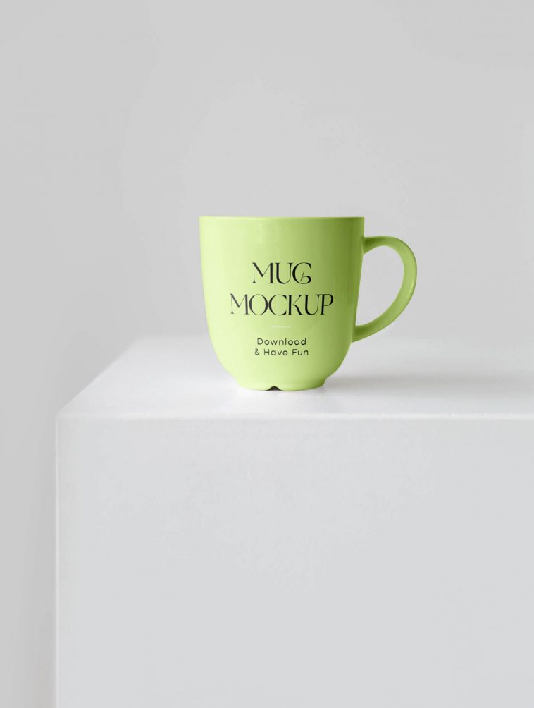 Front View of a Ceramic Mug Mockup on a Cube