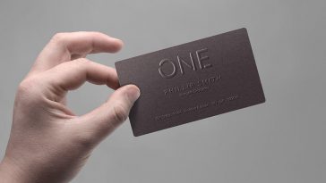 Hand Holding Realistic Business Card Mockup