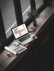 MacBook Pro in Cafe Environment Mockup