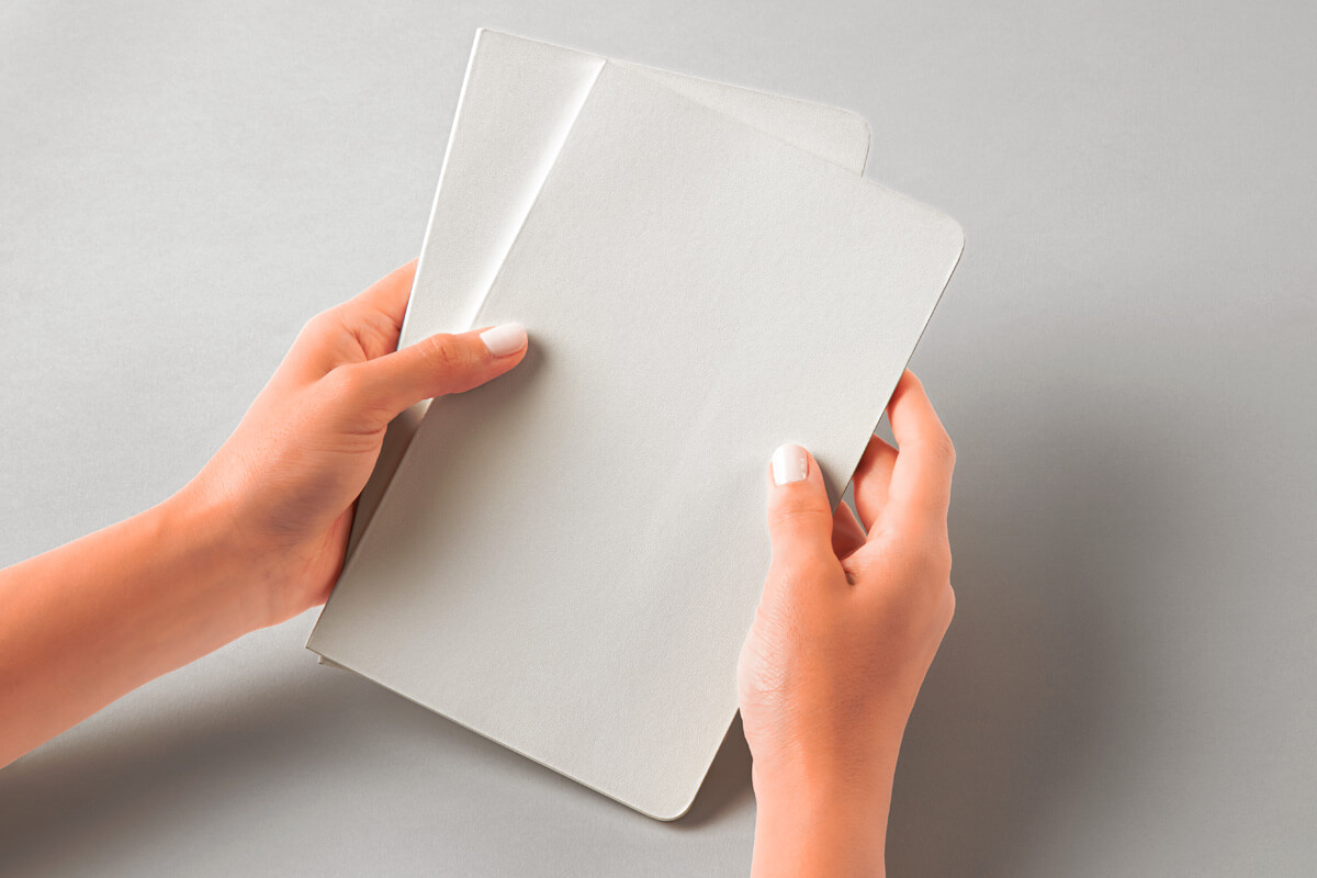 Hands Holding Notebook Mockup