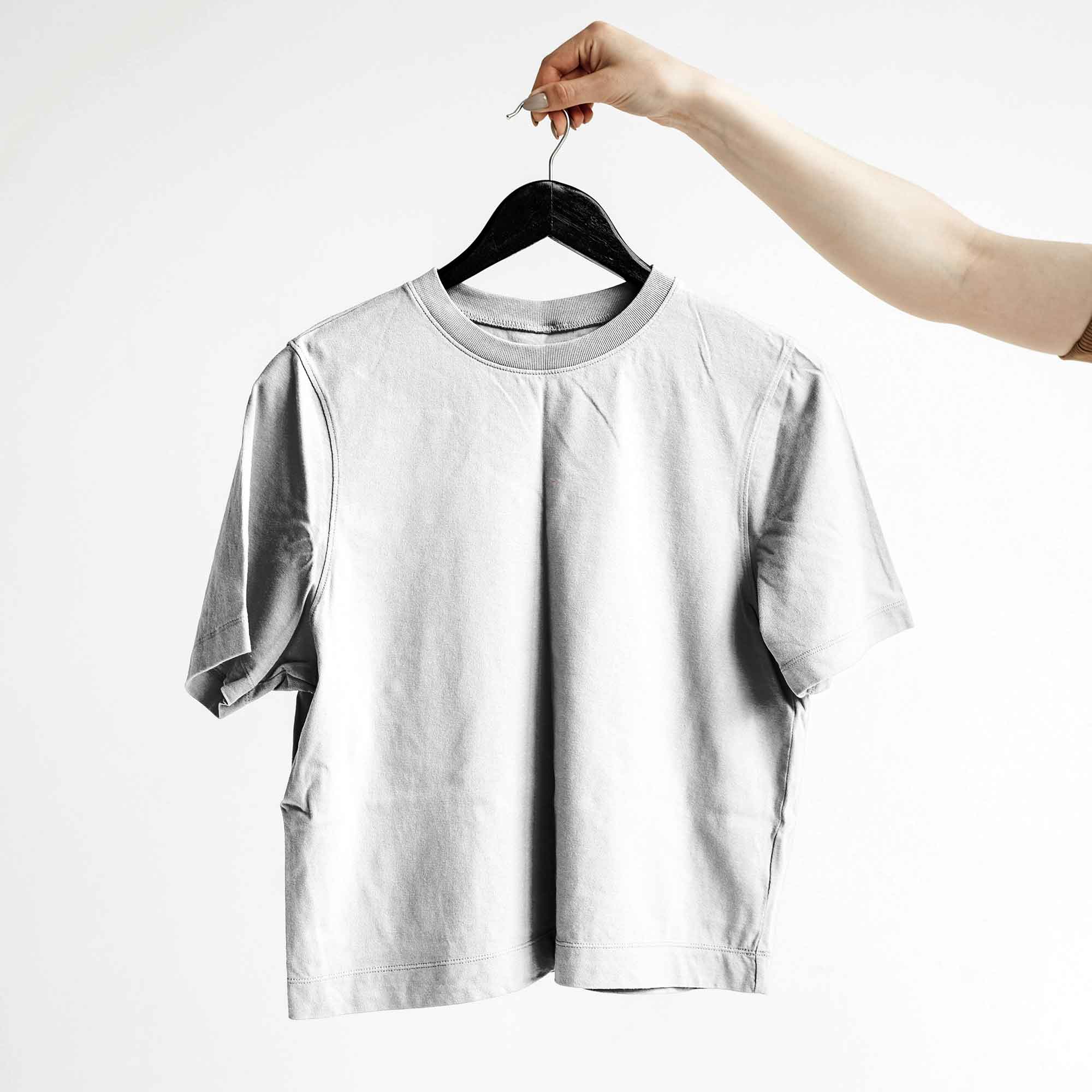 Shirt Held by a Hanger Mockup PSD