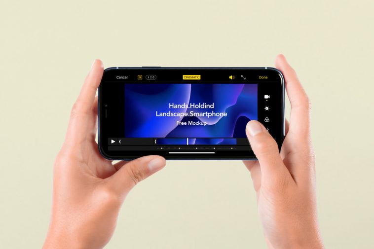 Front View of a Hand-Holding Landscape Smartphone Screen Mockup