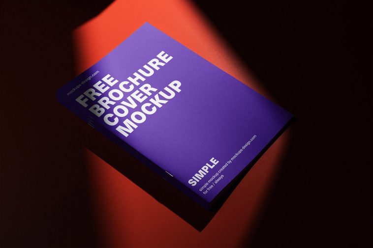 Free Center Pin Brochure Cover On Red Mockup PSD