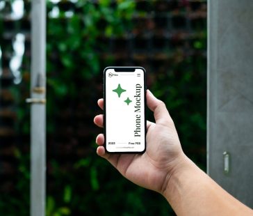 Hand Holding Smartphone Mockup Free