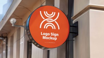 Free Round Sign Mockup on Building Wall mounted