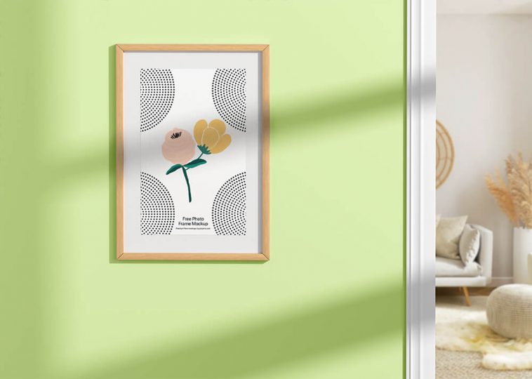Free Wooden Photo Frame on Wall Mockup