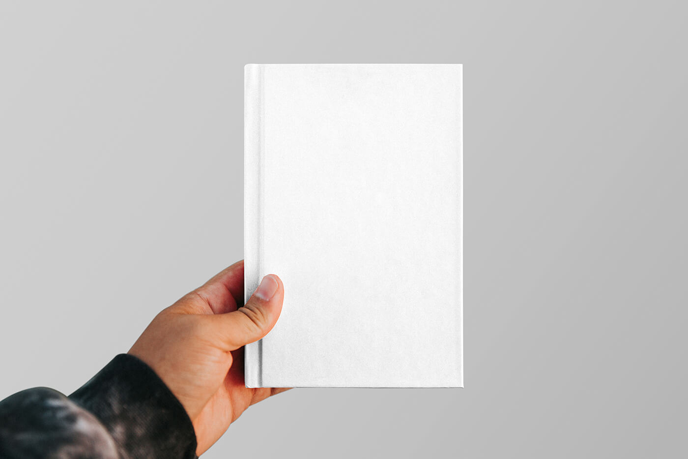 Free Book Cover with Hand Mockup