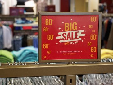 Free Clothing Rack Sale Signage Mockup PSD