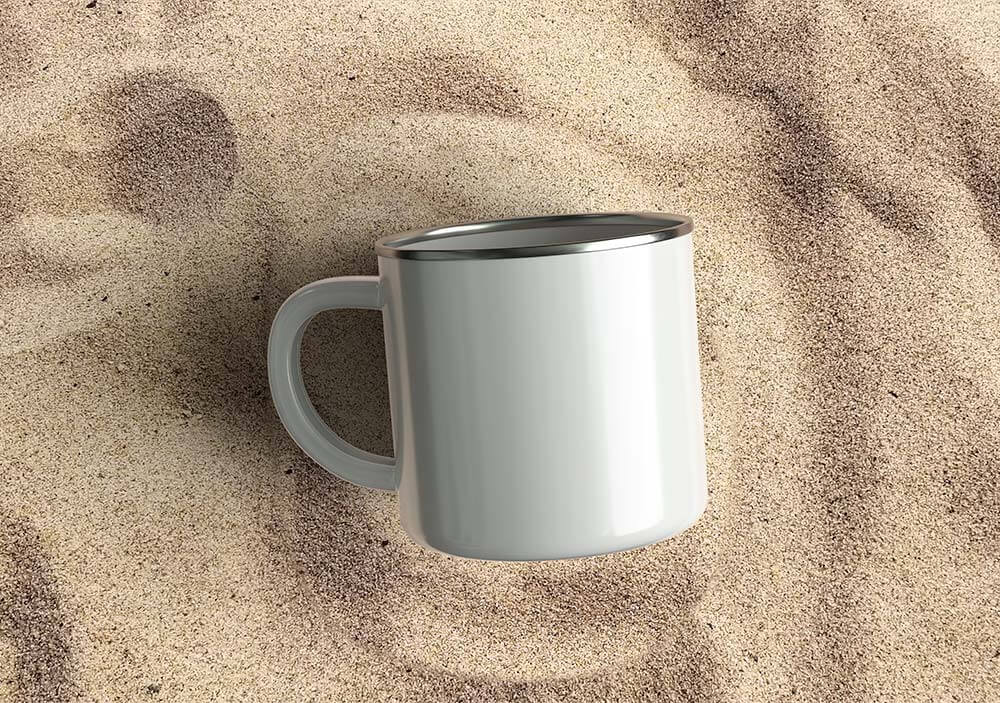 Free Enamel Mug on Sand Mockup