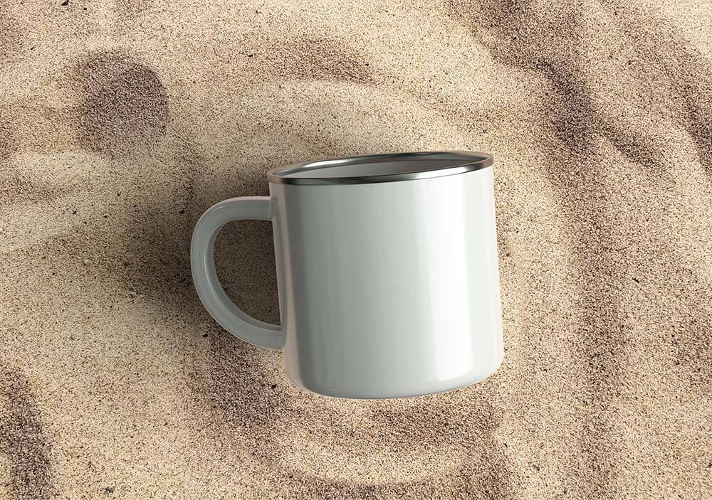 Free Enamel Mug Mockup On Sand   PsFiles