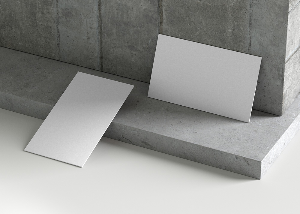 Free Business Card on Textured Wall Mockup