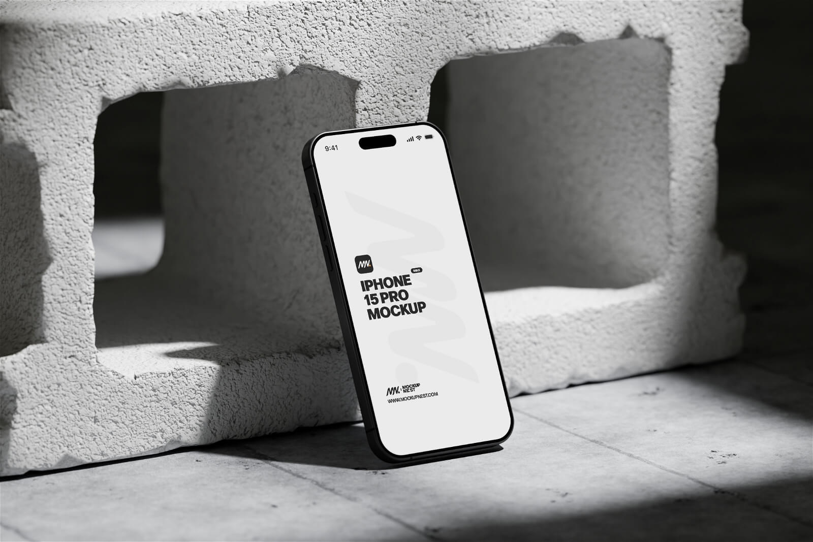 Free iPhone 15 Pro On Concrete Brick Mockup PSD Set