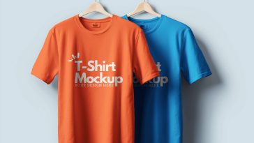 Two hanging t-shirts, one orange and one blue, T-Shirt Mockup and "Your Design Here," against a light blue background.