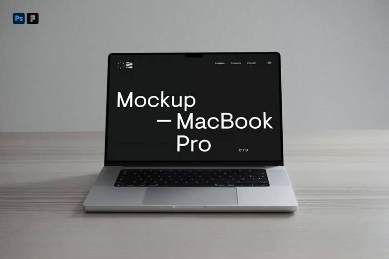 Free Silver MacBook Pro on Desk Mockup