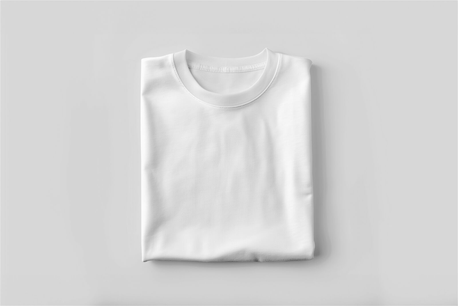 Free Folded T-Shirt Mockup