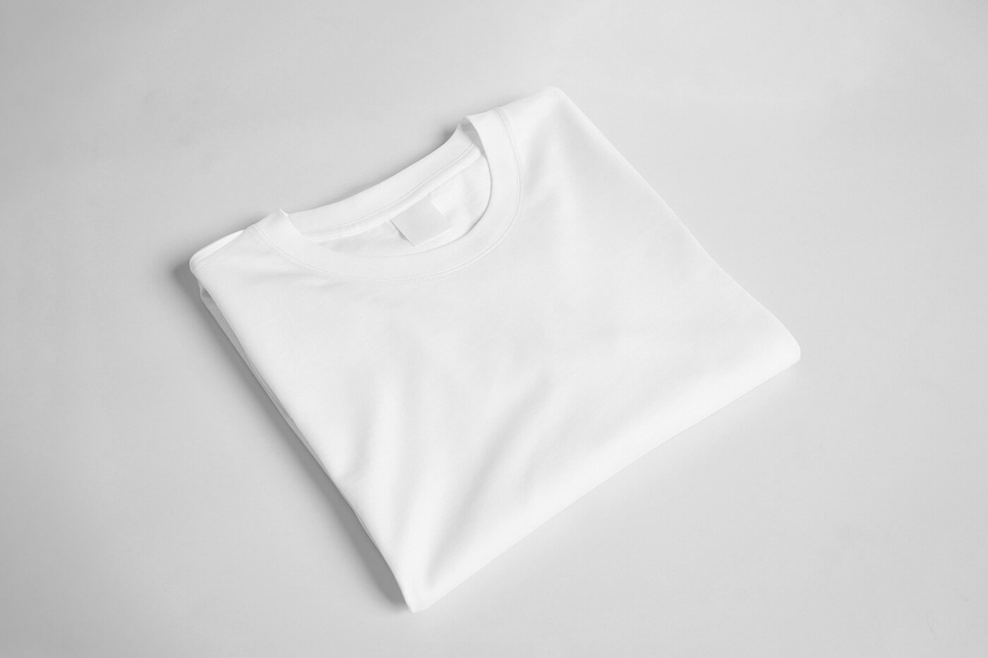 Free Perspective Folded T-Shirt Mockup PSD