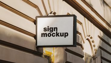 Free Square Wall Mounted Signboard On Building Mockup PSD