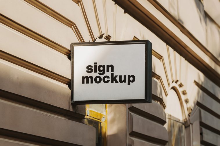 Free Square Wall Mounted Signboard On Building Mockup PSD