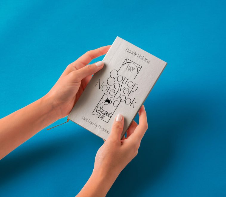 Cotton Hand Holding Notebook Mockup