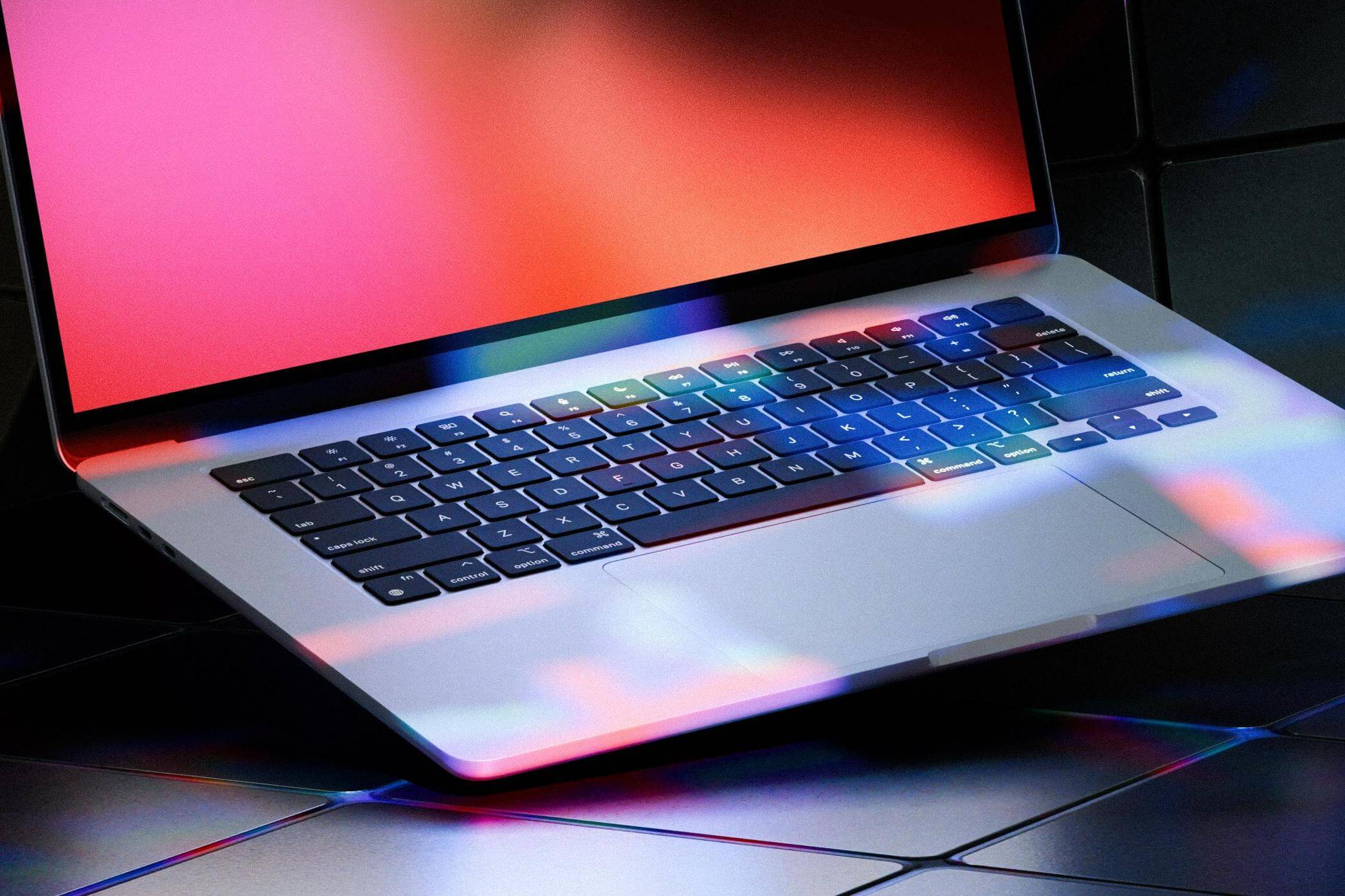 Free Neon Light MacBook Air Mockup PSD