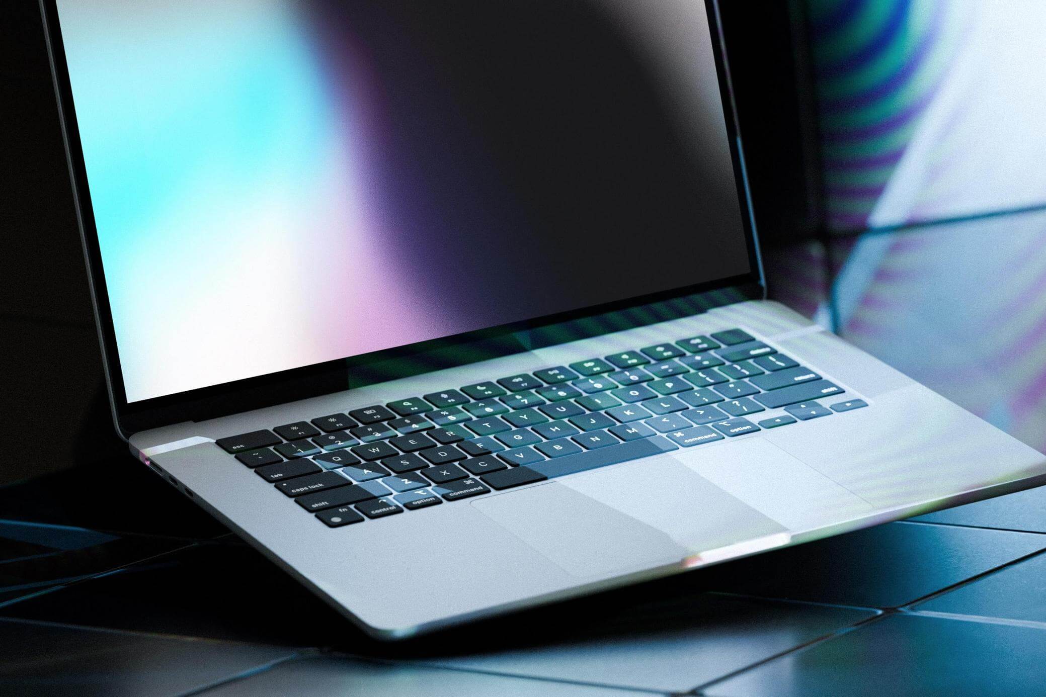 Free Neon Light MacBook Air Mockup PSD